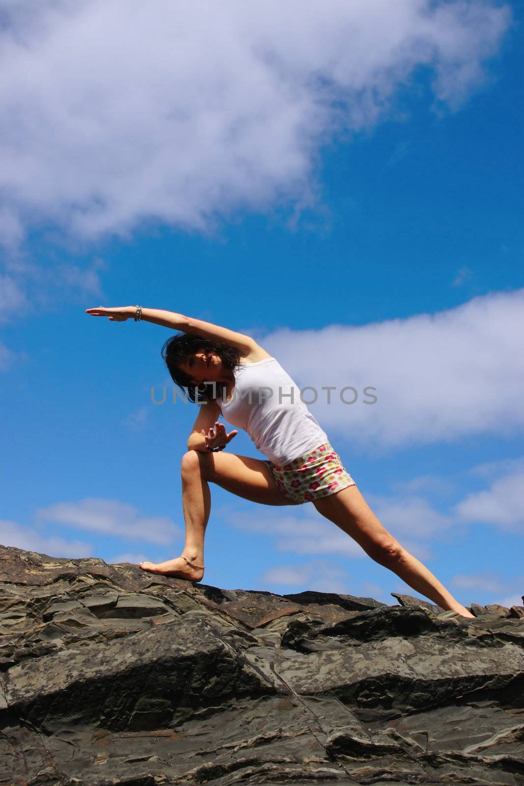 a beautiful woman doing yoga to show a healthy way to live a happy and relaxed lifestyle in a world full of stress