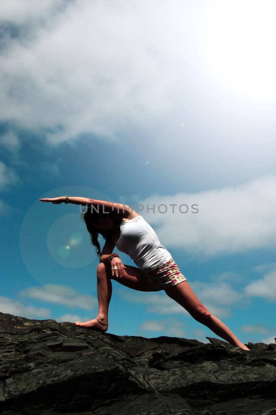 a beautiful woman doing yoga to show a healthy way to live a happy and relaxed lifestyle in a world full of stress