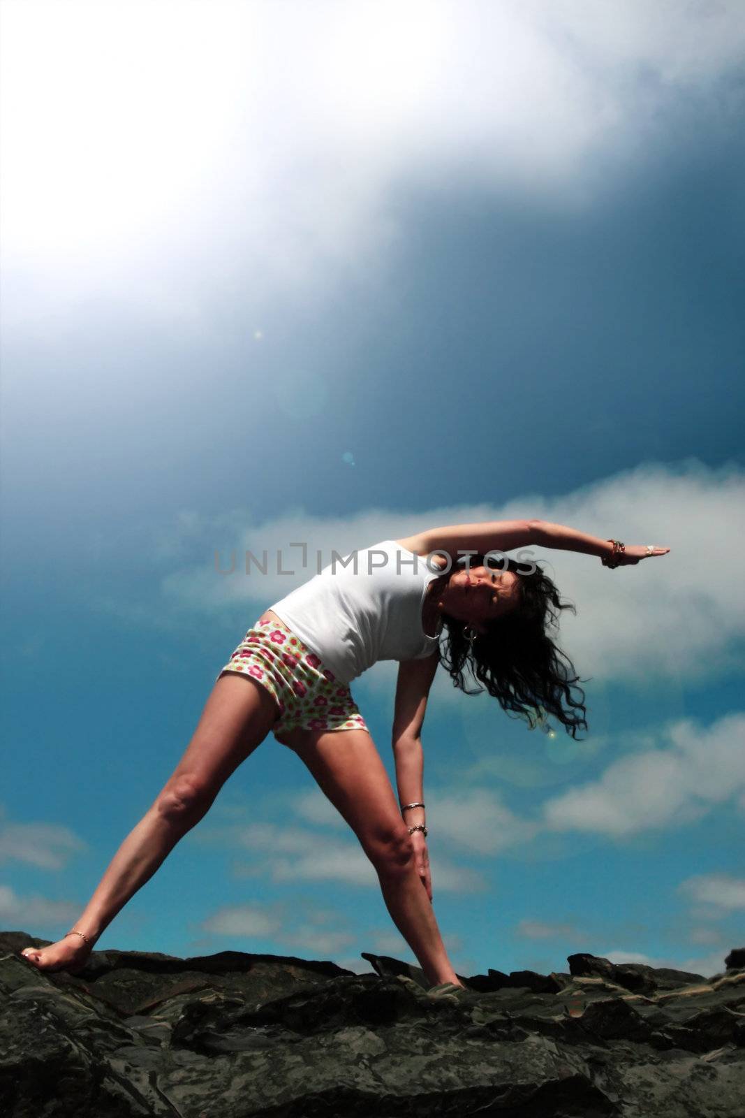 a beautiful woman doing yoga to show a healthy way to live a happy and relaxed lifestyle in a world full of stress