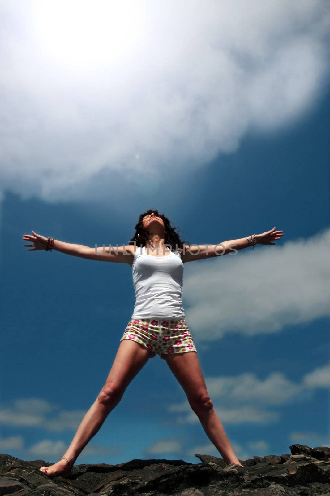 a beautiful woman doing yoga to show a healthy way to live a happy and relaxed lifestyle in a world full of stress