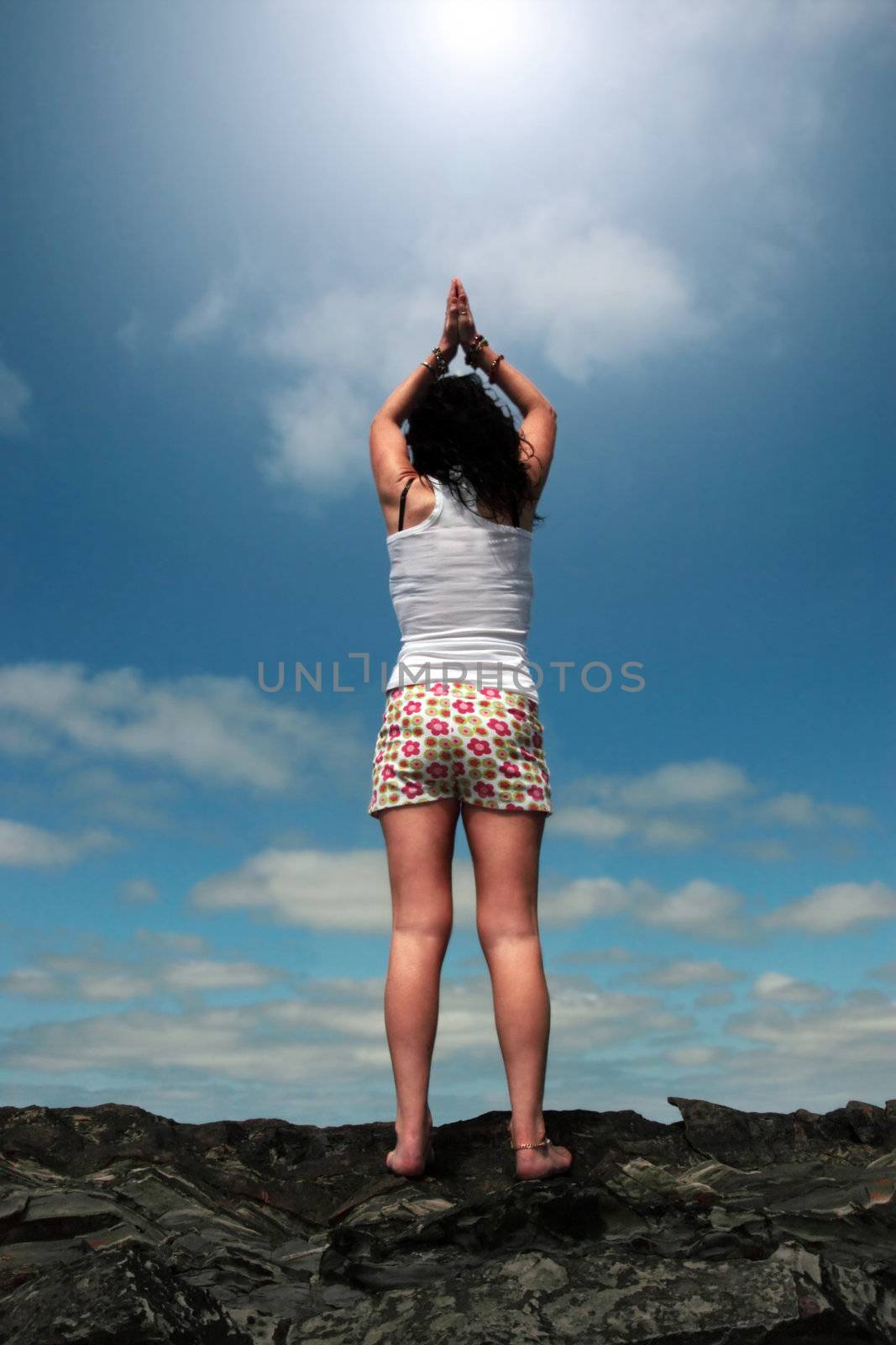 a beautiful woman doing yoga to show a healthy way to live a happy and relaxed lifestyle in a world full of stress