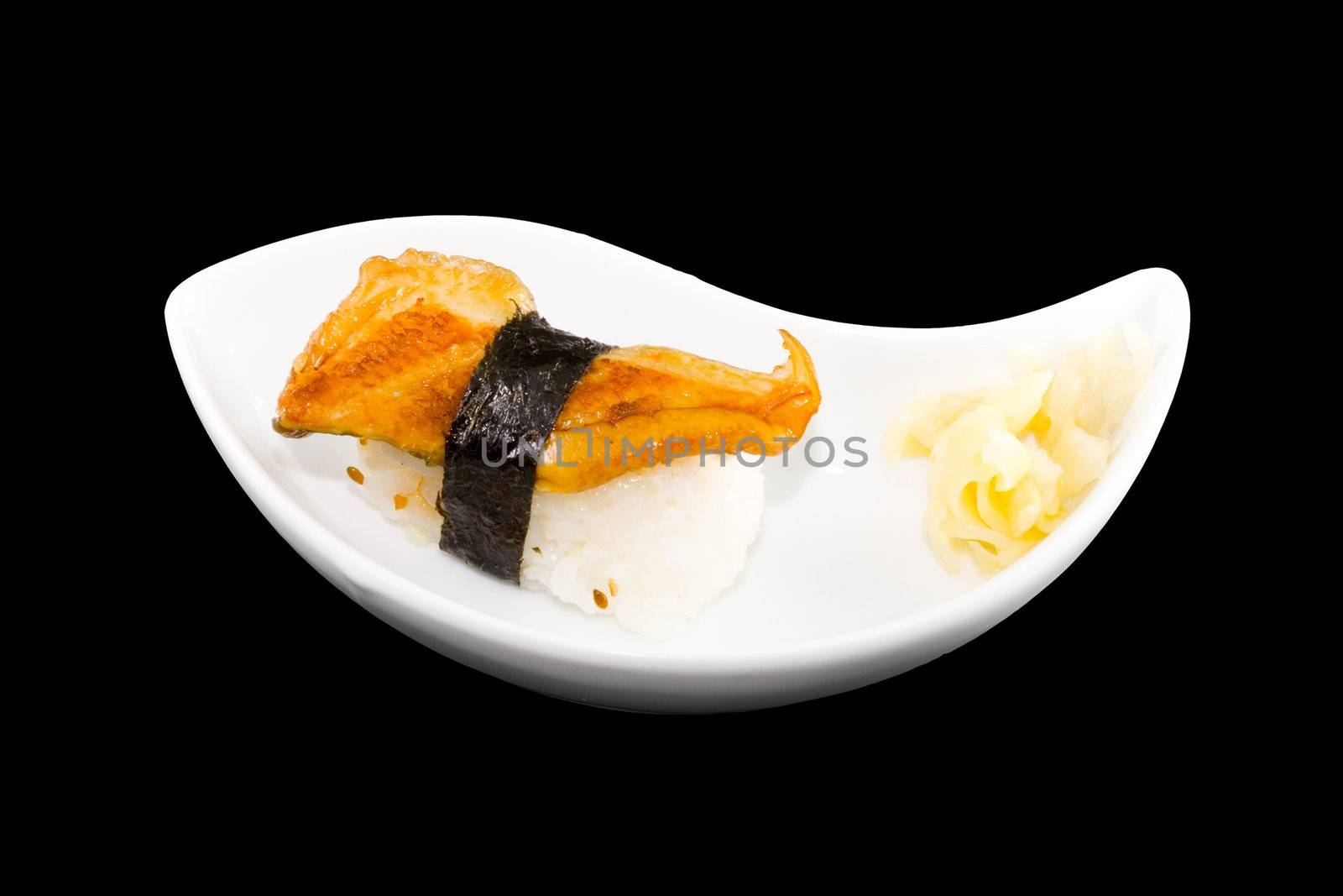 a white plate with a piece of sushi