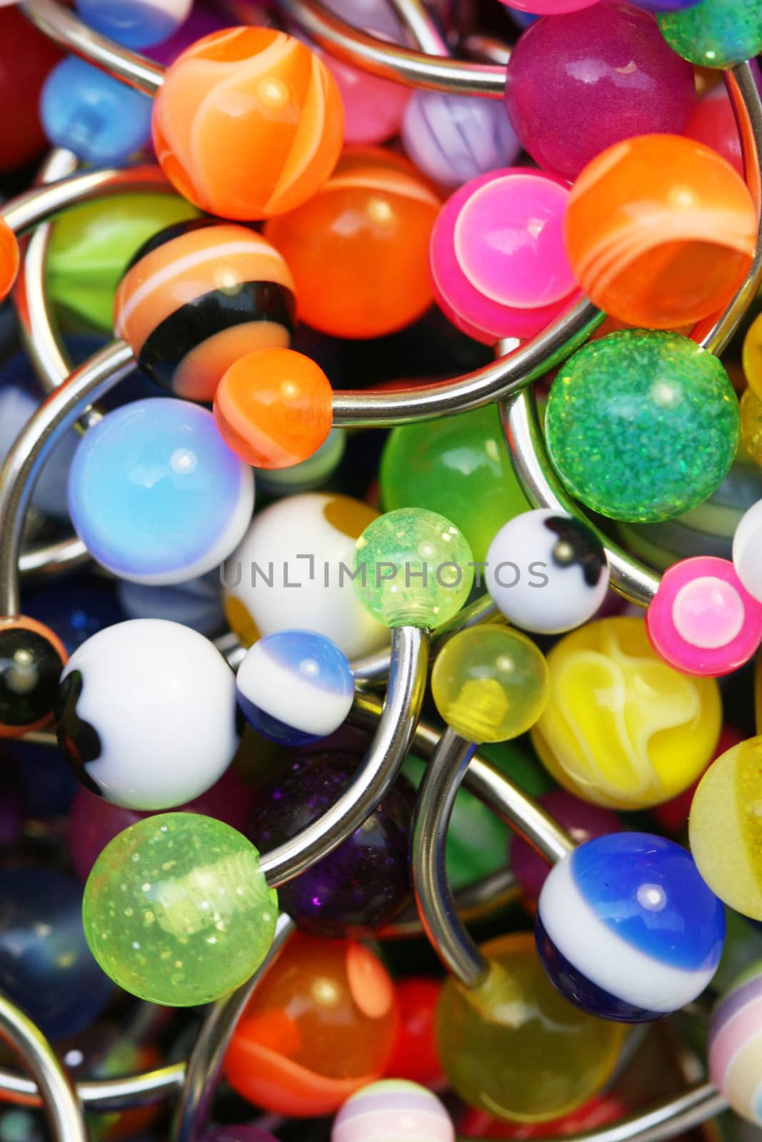 A giant pile of colorful belly rings.