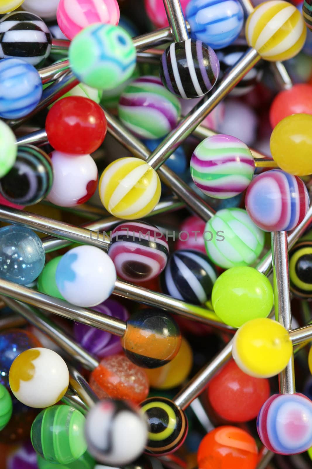 A giant pile of colorful tongue rings.