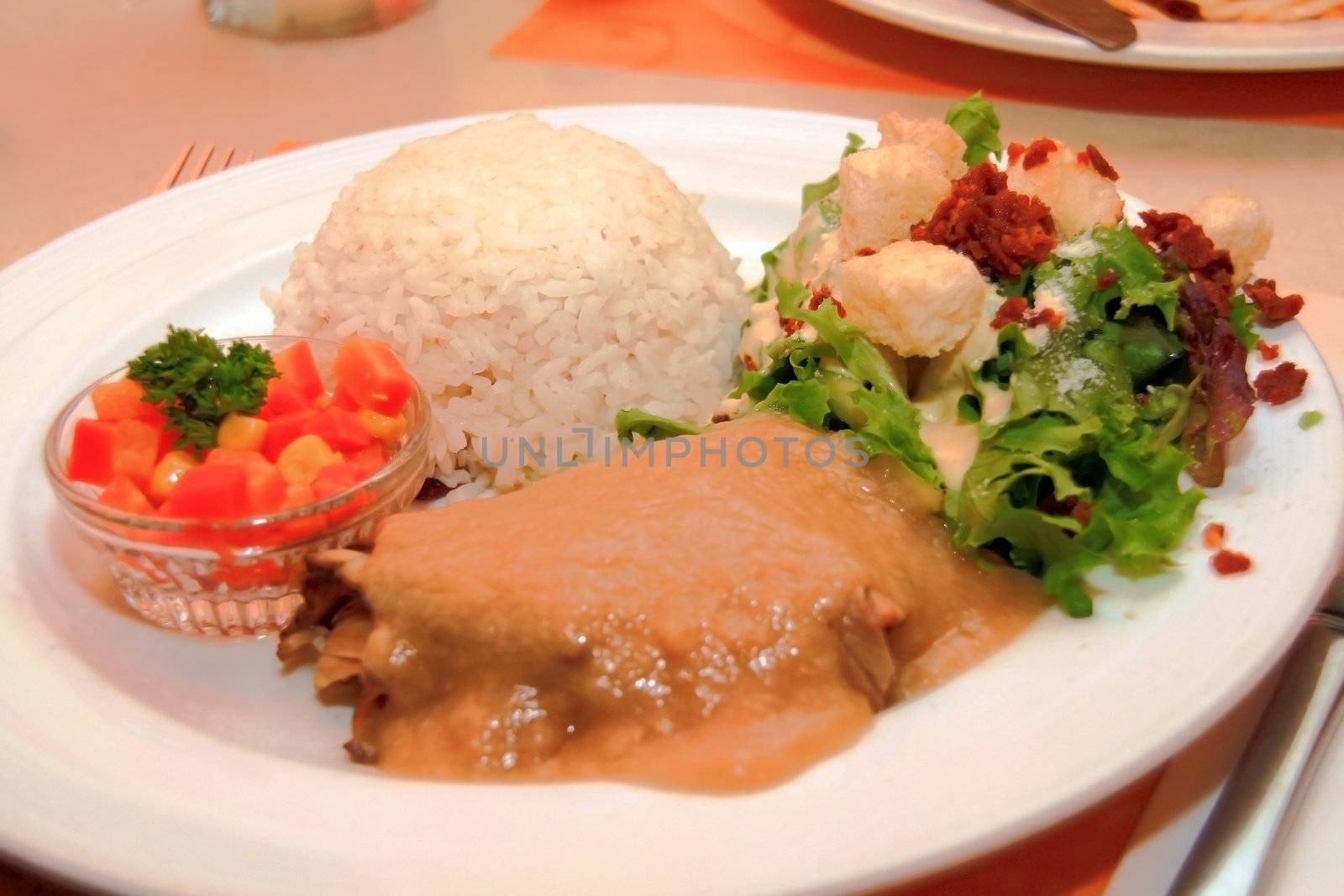 roast beef meal with salad and vegetable side dish
