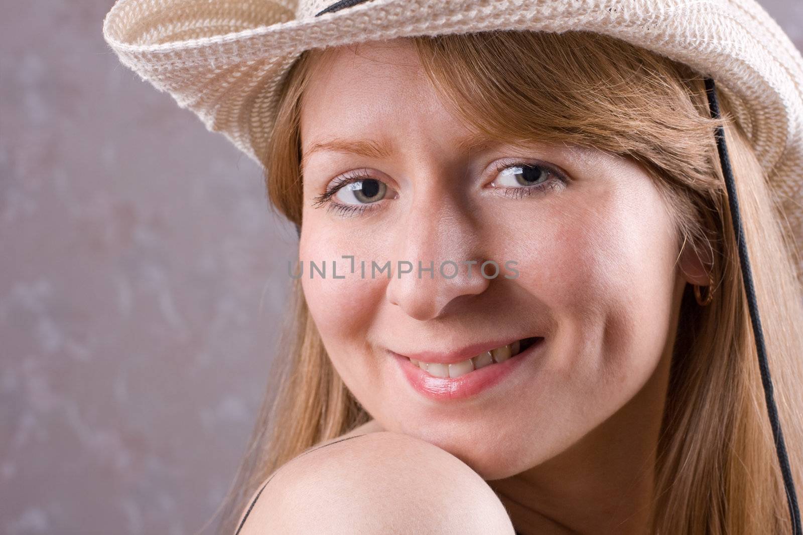 Portrait of smiling cowgirl. #2