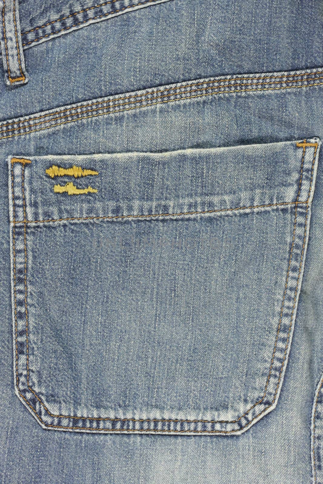 Blue jeans back pocket by Georgios