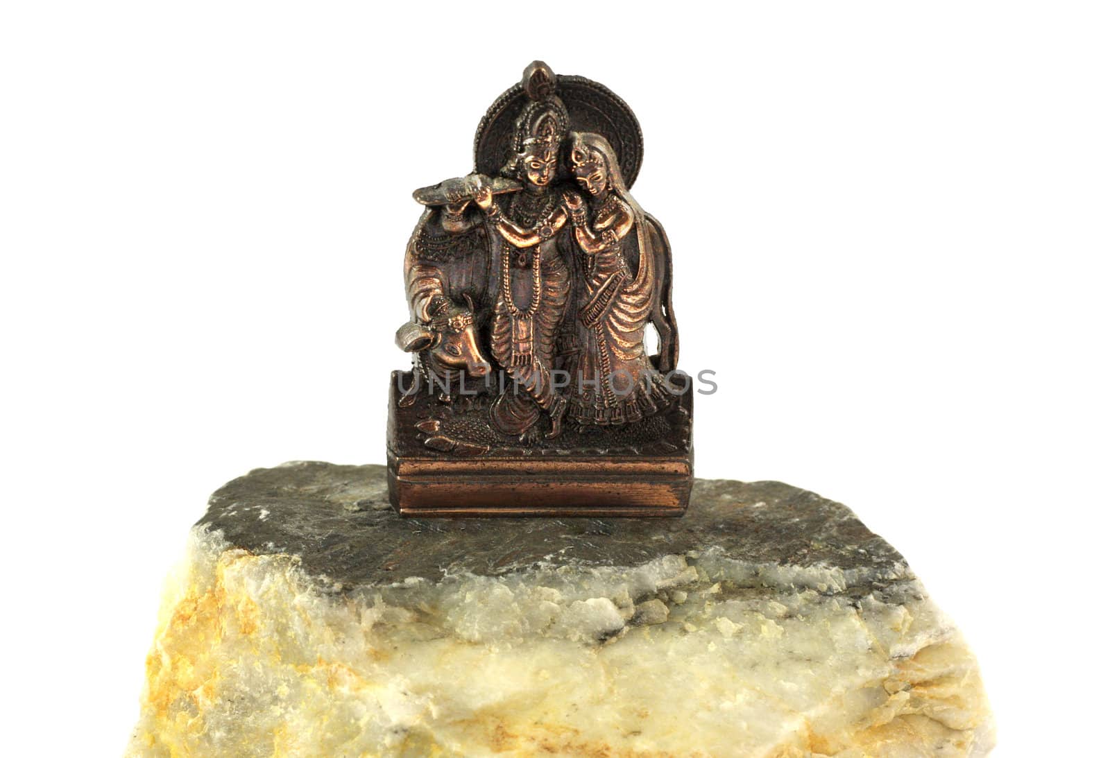 Bronze sculpture of indian deity ''krishna'' that is worshiped across many traditions of Hinduism. He is usually depicted as a young cowherd boy playing a flute.