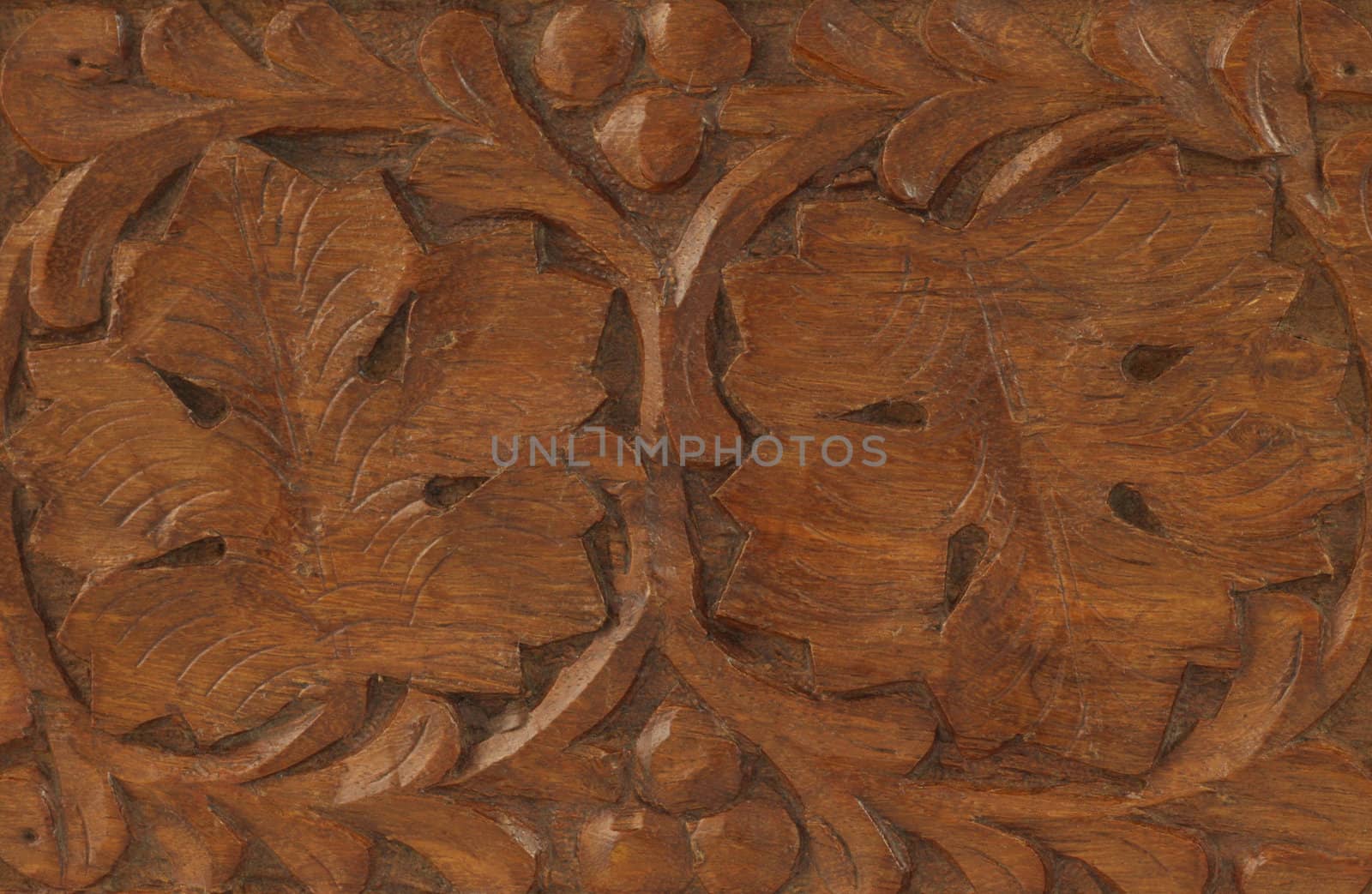 Close up of leaves design engraved on wood