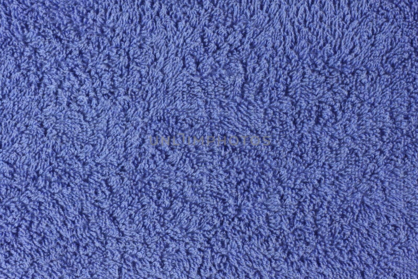 Slighty worn purple towel texture