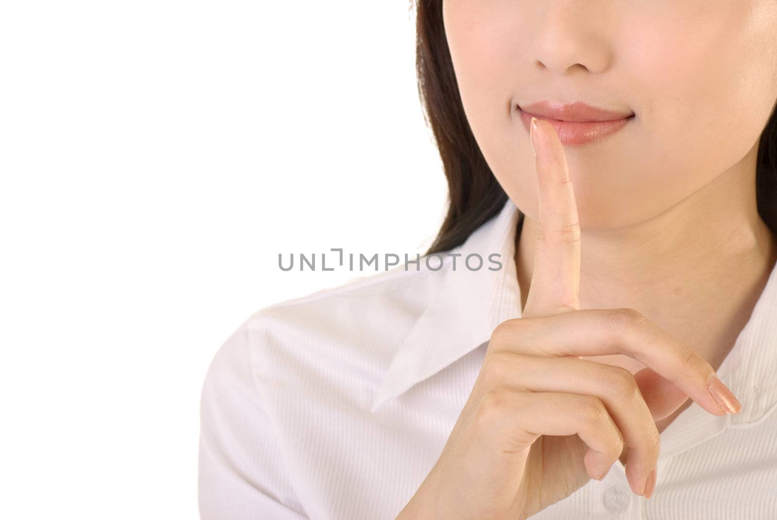 Silent sign with gesture by business woman, closeup image on white background.