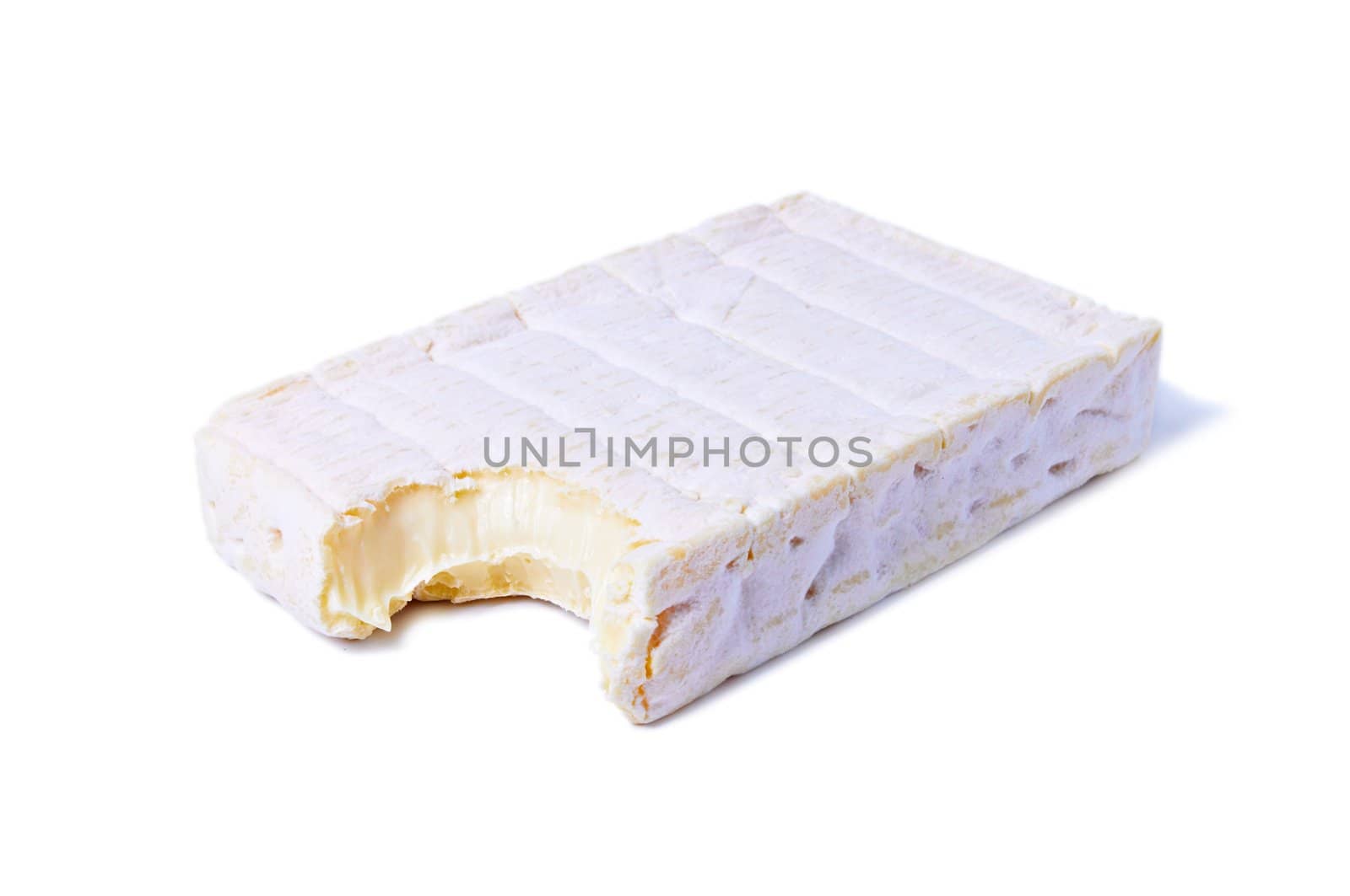 Bitten piece of Gourmet Brie Cheese isolated on white