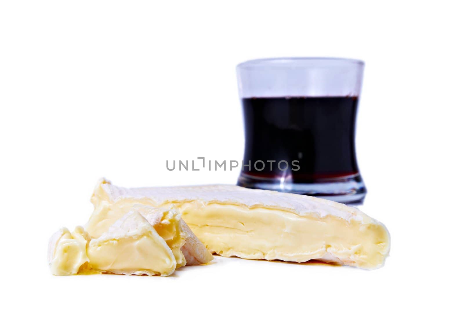 Brie cheese and gas of red wine isolated on white