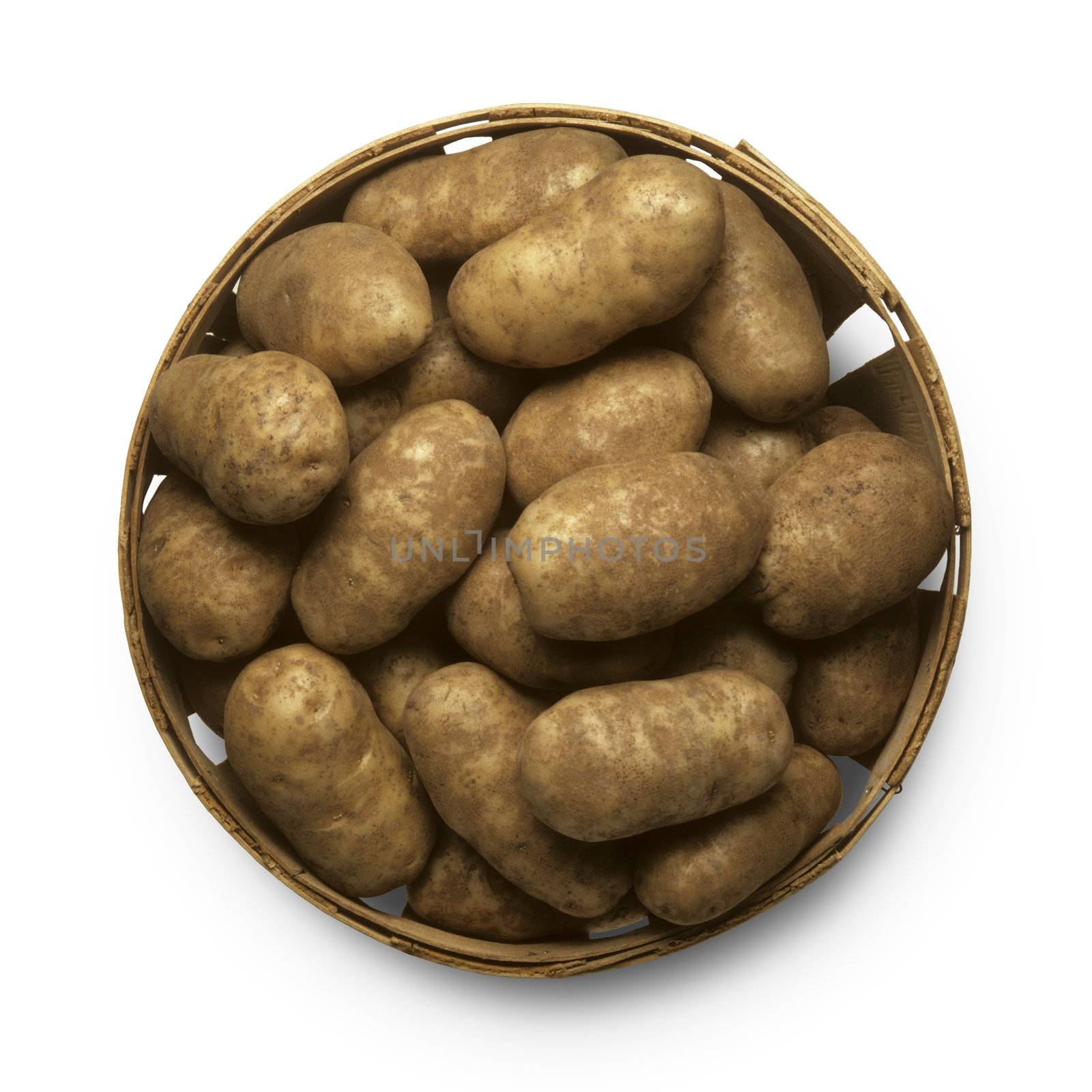Basket of potatoes against white background