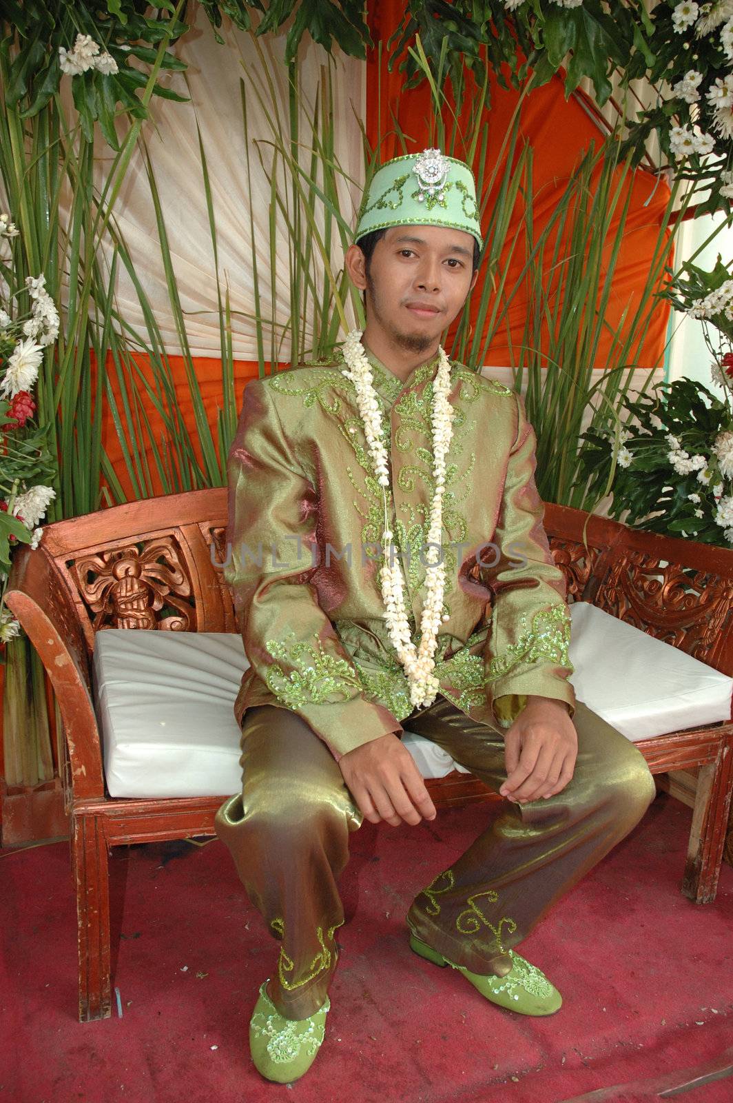 groom wearing traditional costume from west java-indonesia