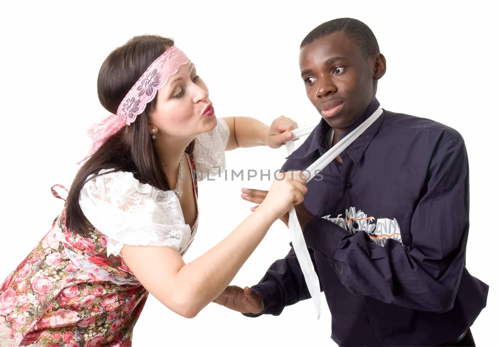 Come over here and kiss me, baby. Black man and white woman on a white background.