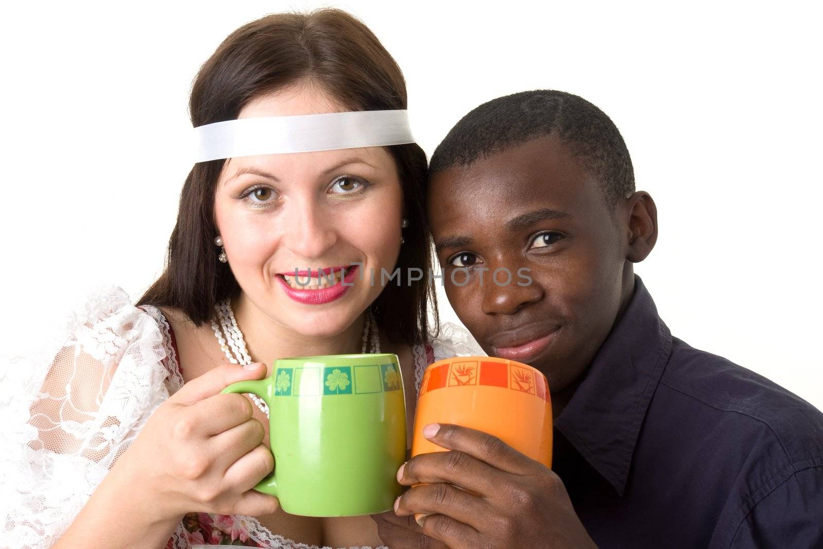 Get warm. Black man and white woman drink tea.