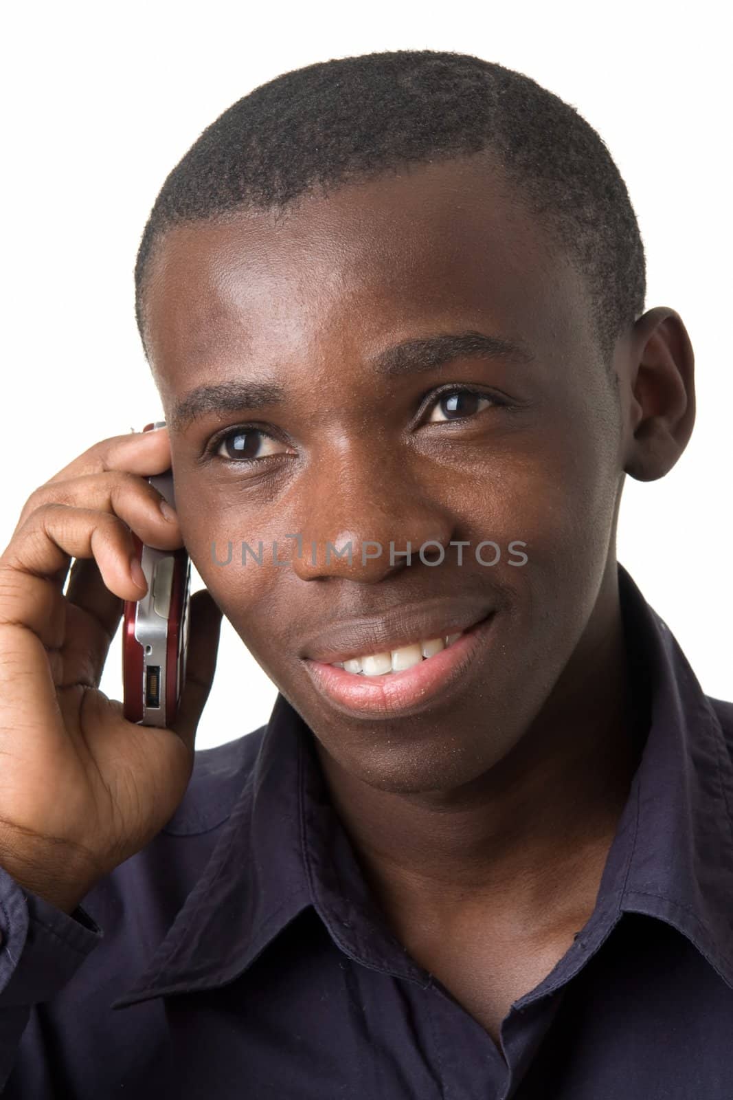 smiling man with mobile phone on a white background