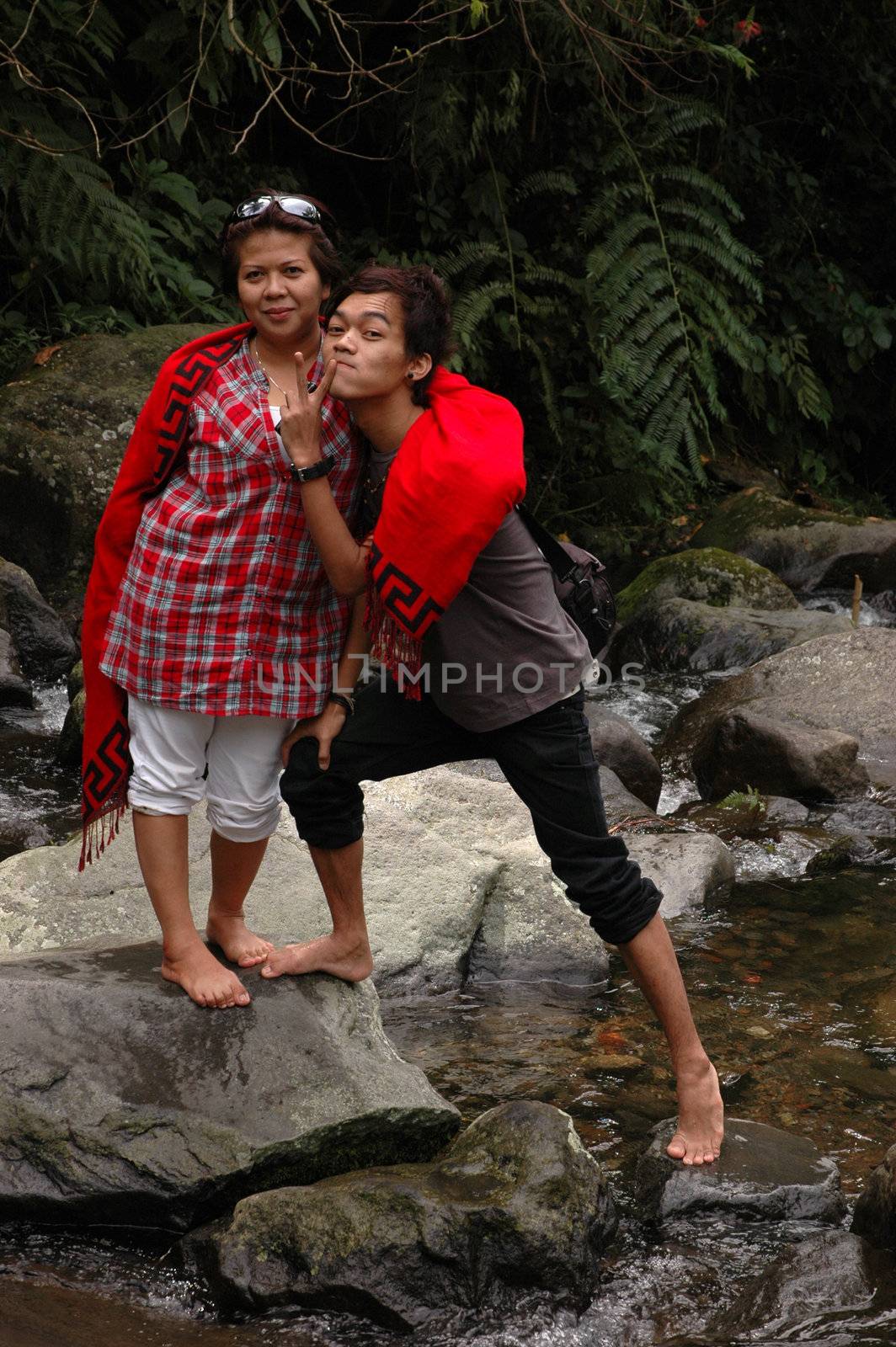 mom and son get possed together in the middle of river
