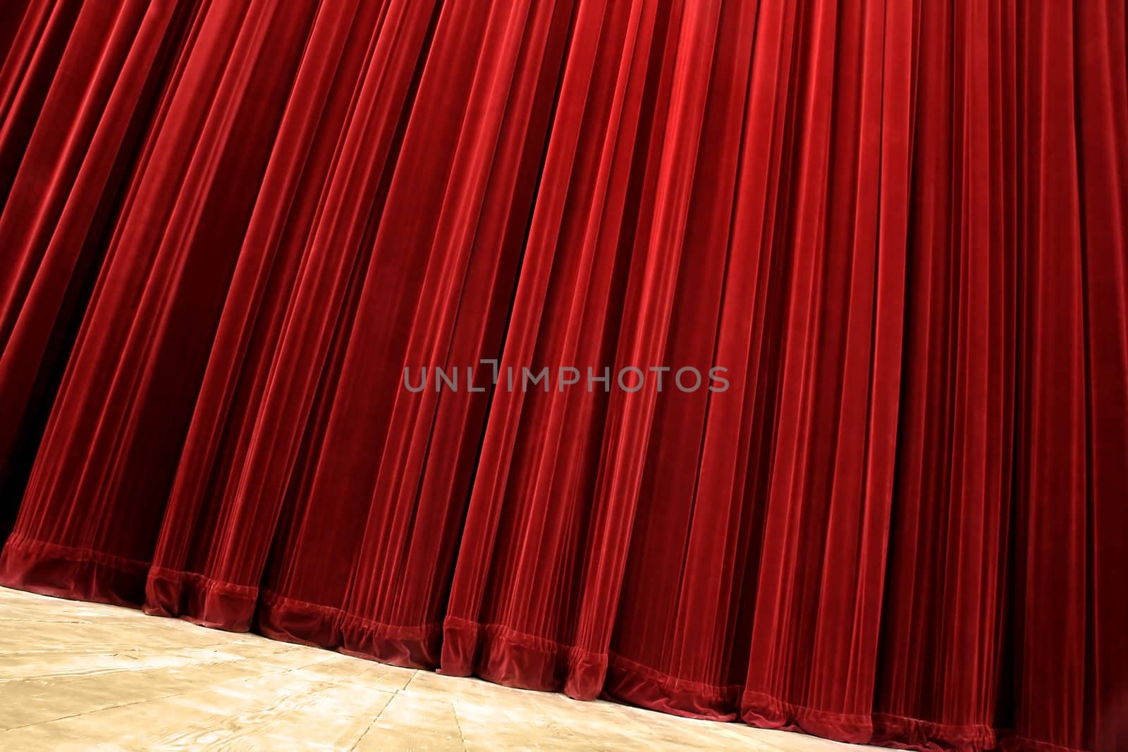red velvet closed curtain, tilted photo, wooden floor