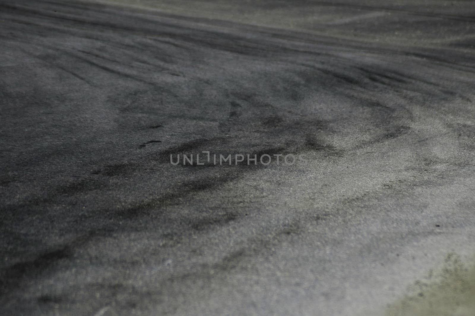 dirty asphalt rally road; tyres skids; gravel