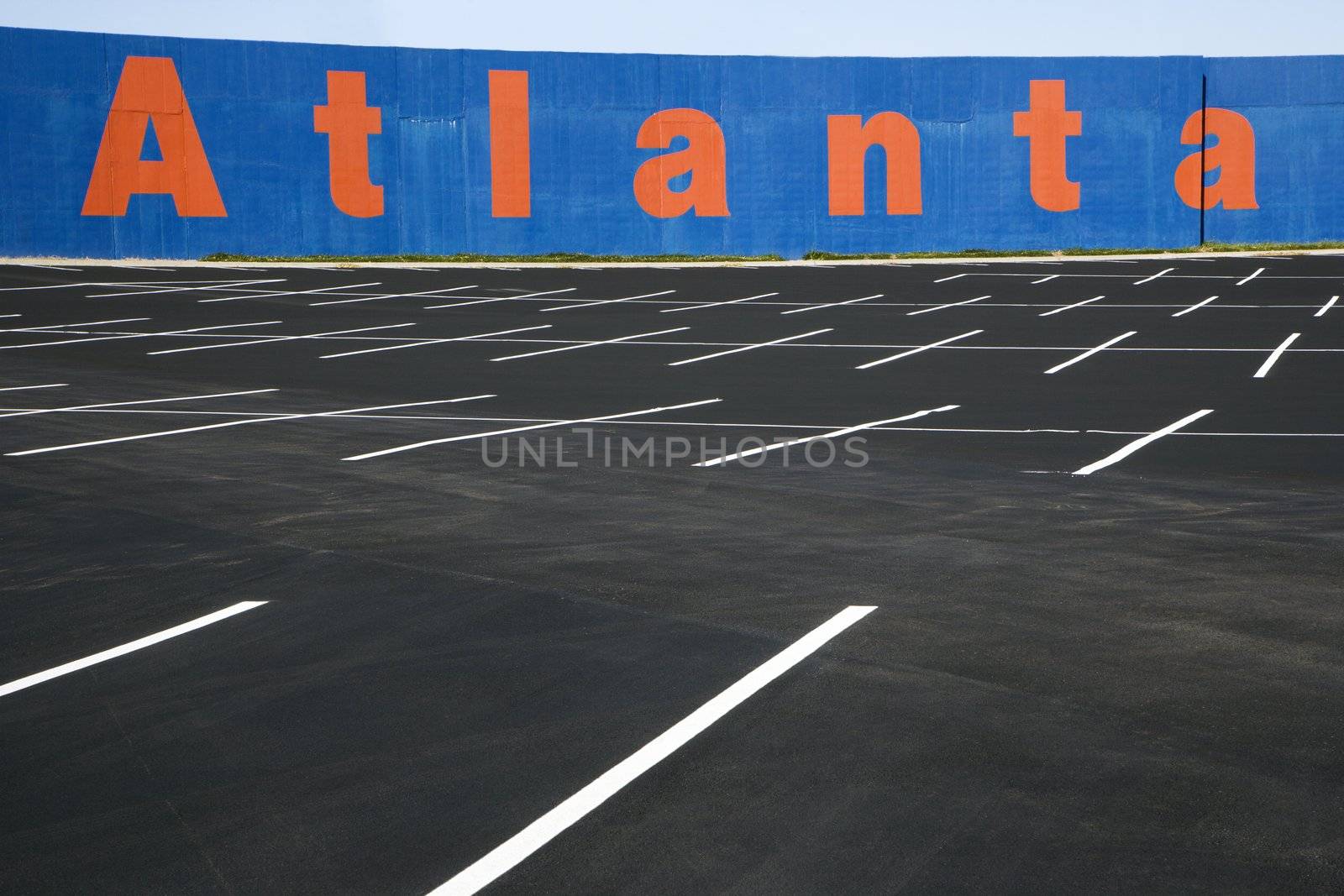 Empty parking lot with Atlanta painted on wall in Atlanta, Georgia.