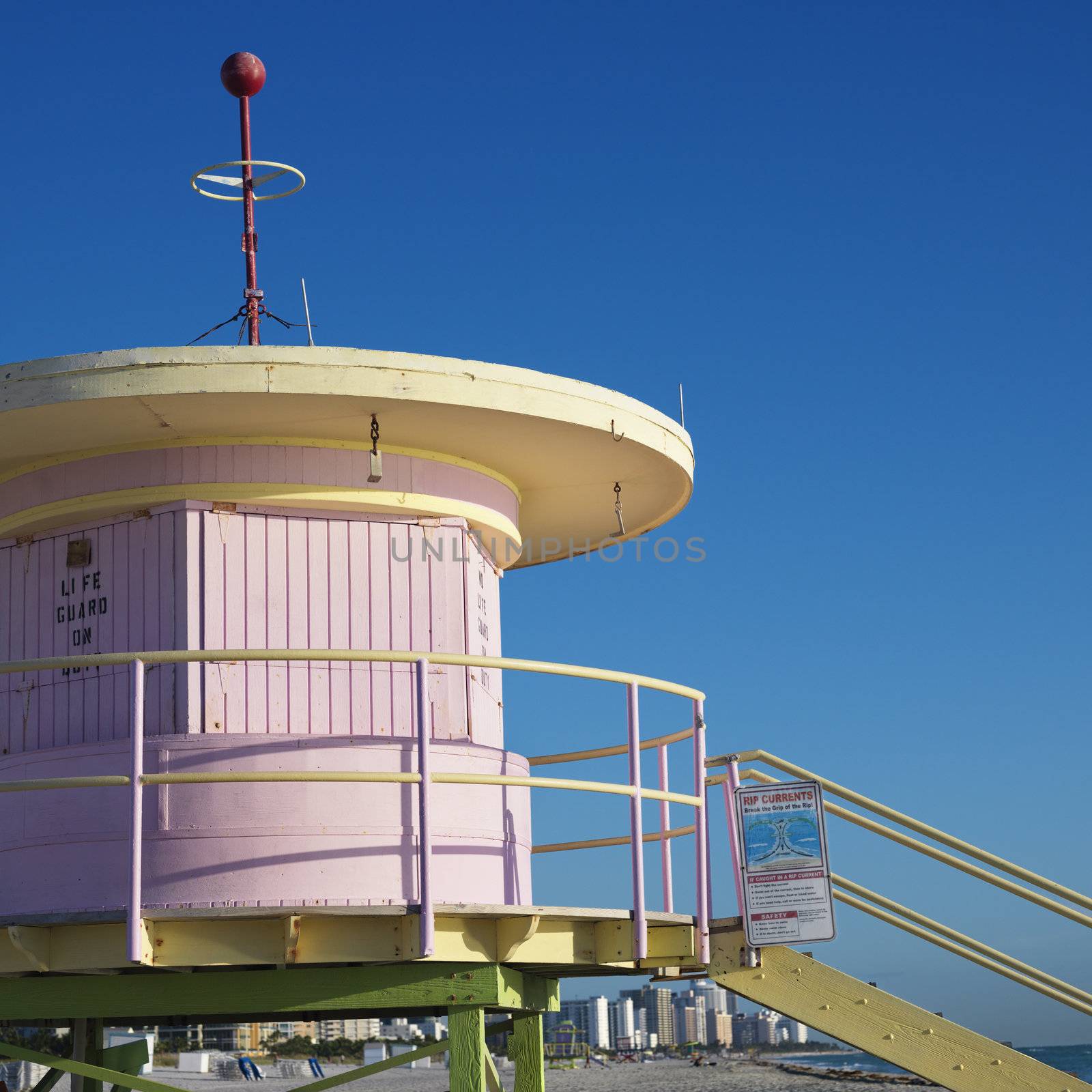 Pink art deco lifeguard tower closed up on beach in Miami, Florida, USA.