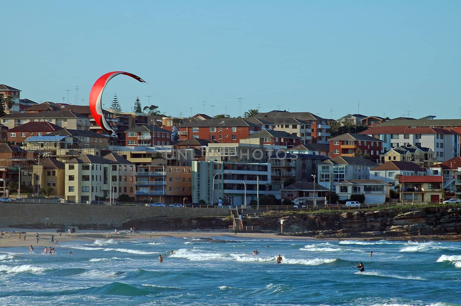 kite surfing and swiming on Maroubra beach in Sydney