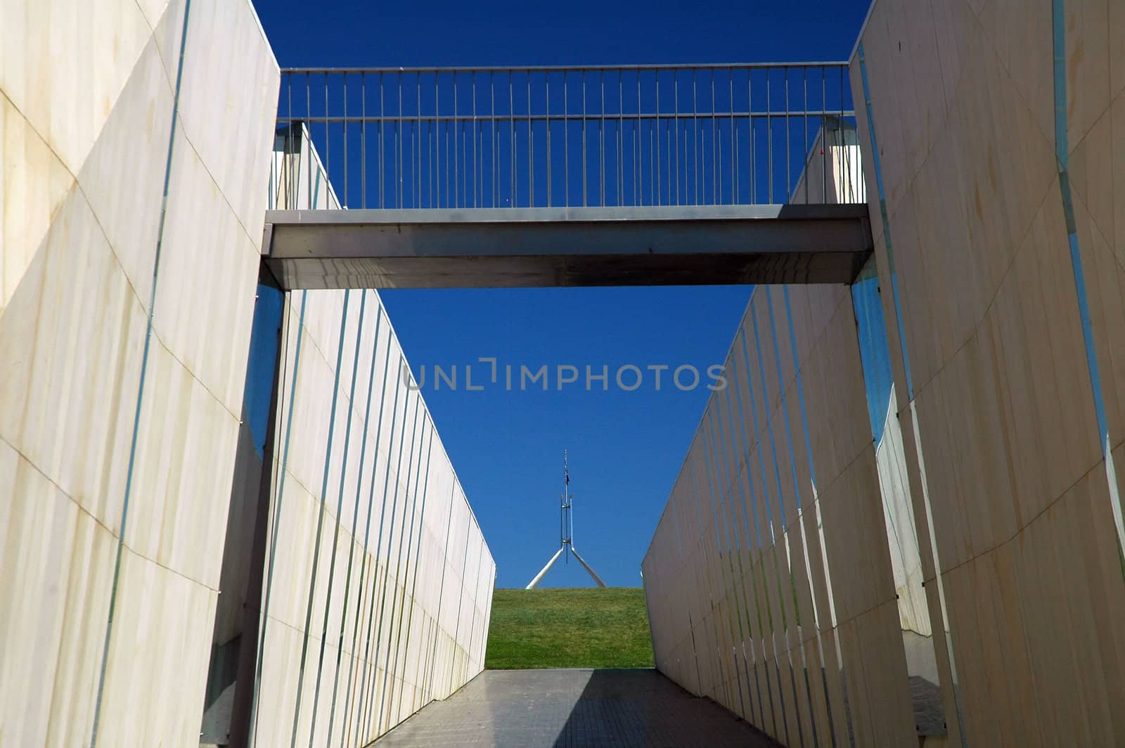 Canberra Parliament House in distance, modern architecture in foreground