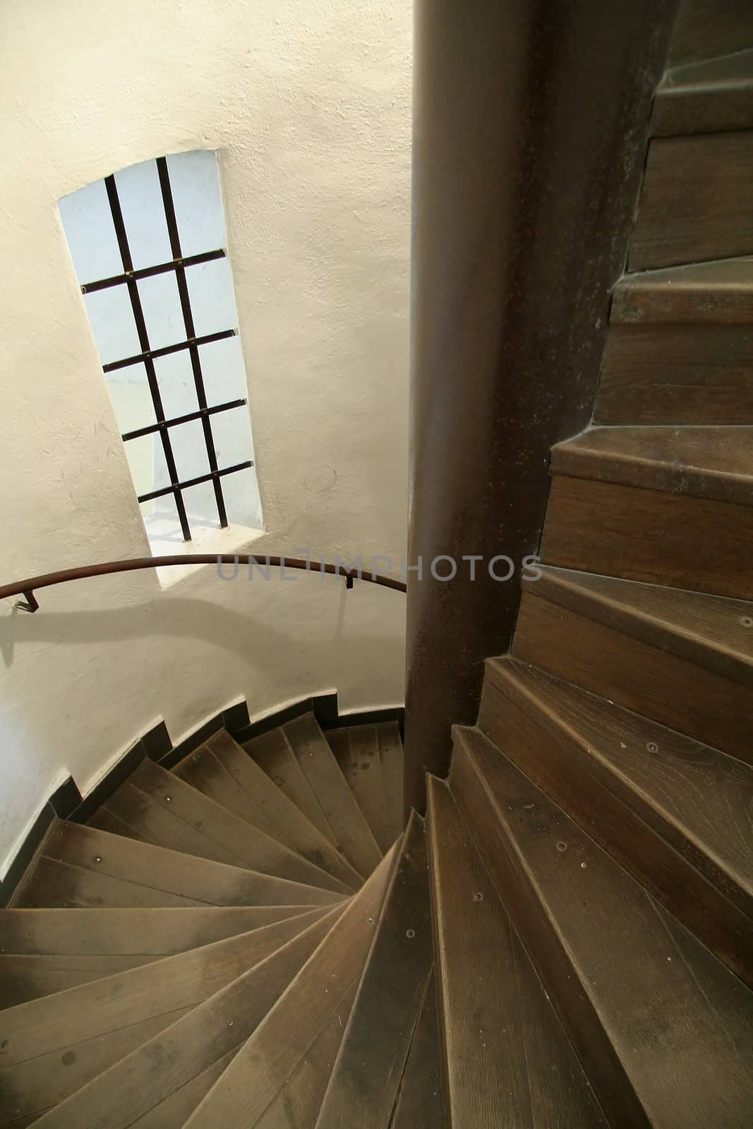 wooden curved staircase in an old church