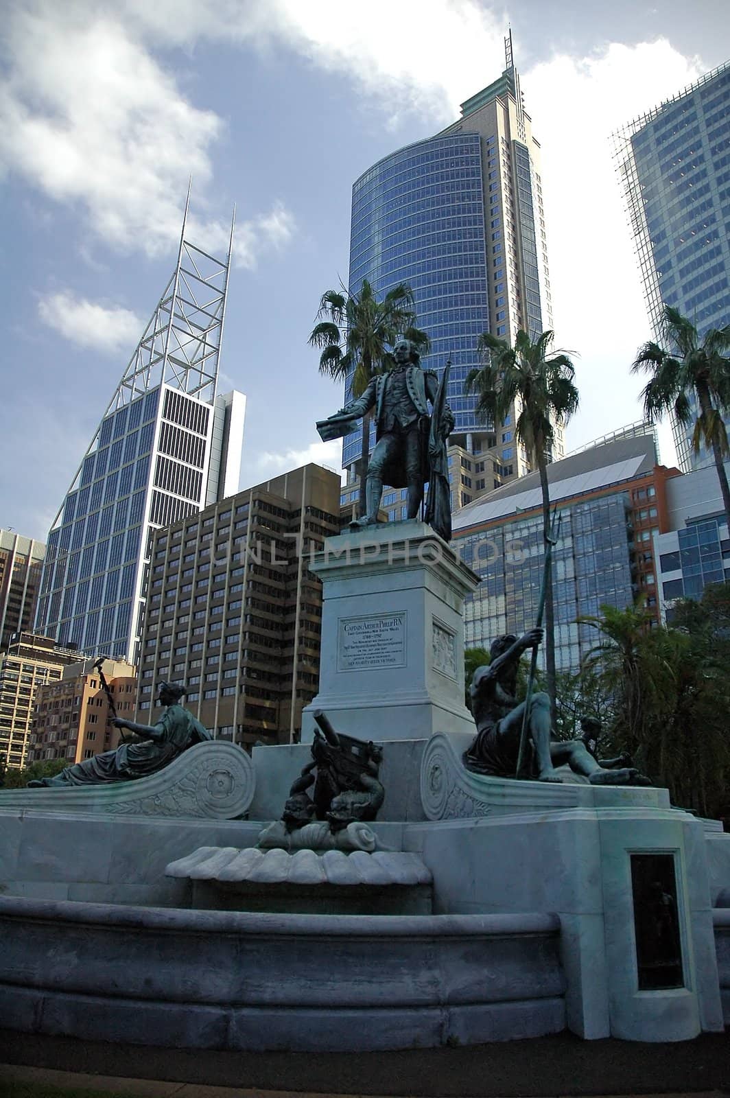 Captain Arthur Phillip statue in Royal Botanic Gardens in Sydney, city centre in background 