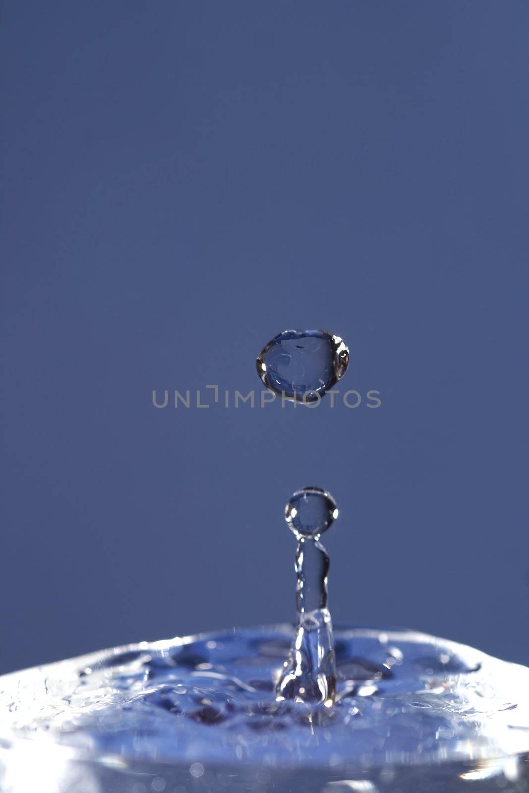 Close-up od the spout - abstract shot of the water