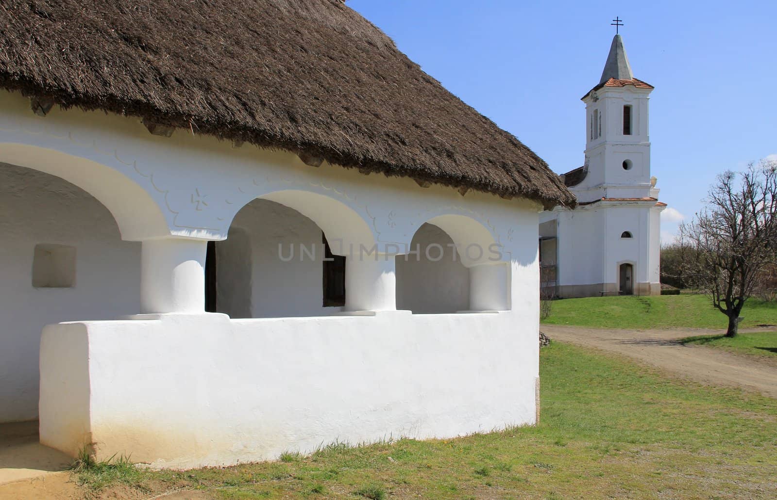 A country house porch and the church.