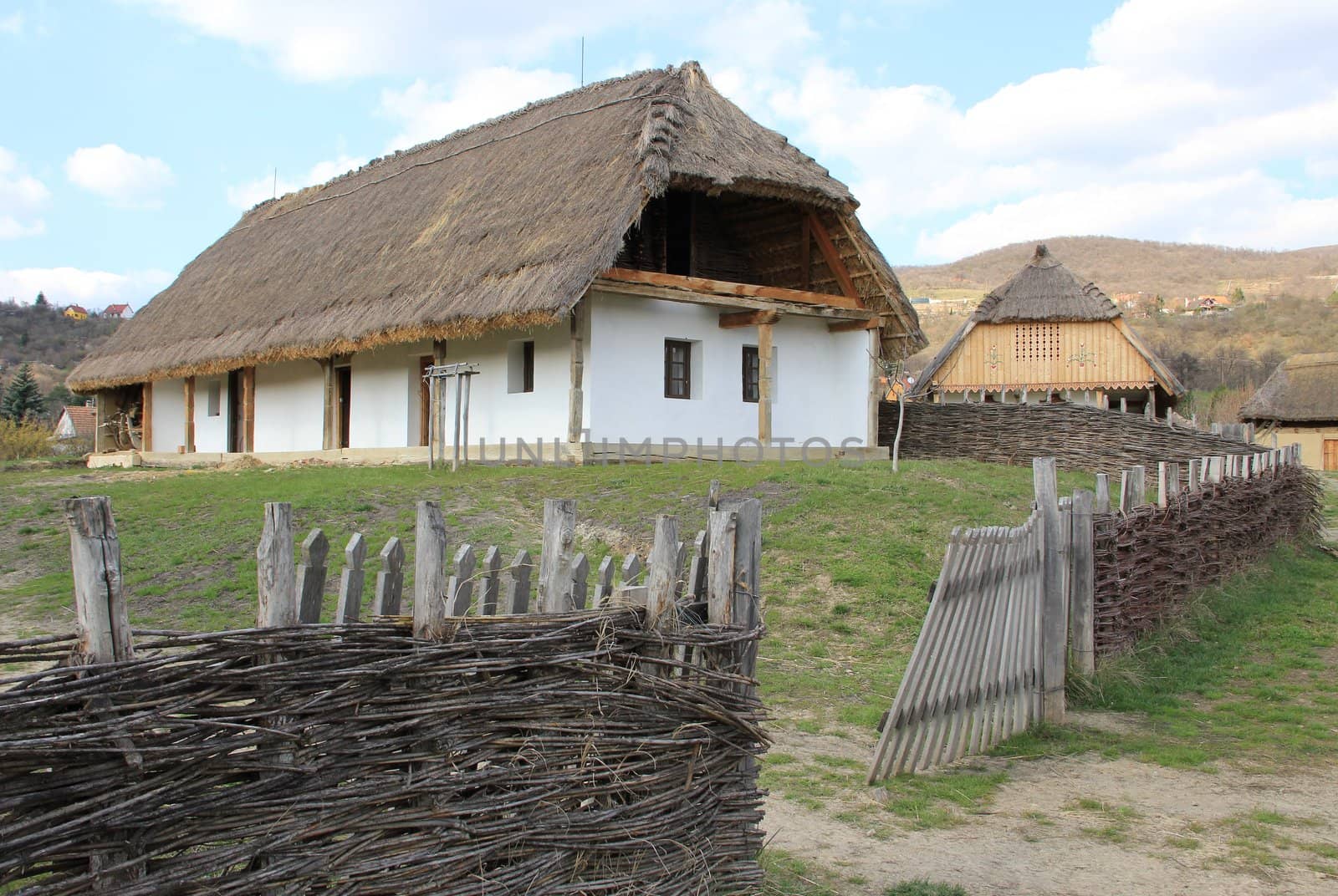 A country house and fence.