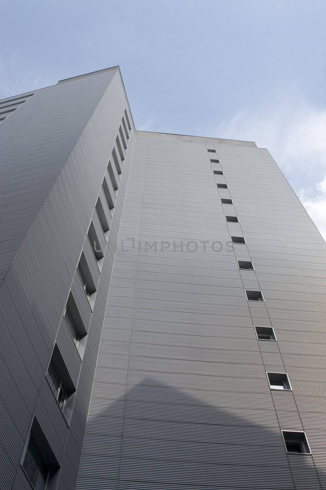 Corporate buildings in perspective on sky background