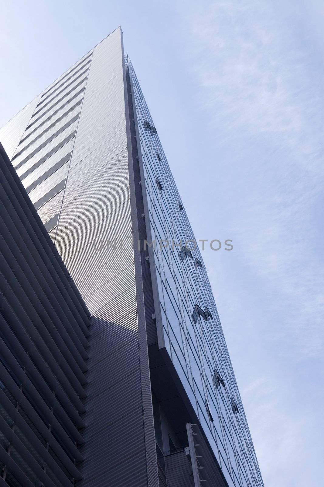 Corporate buildings in perspective on sky background