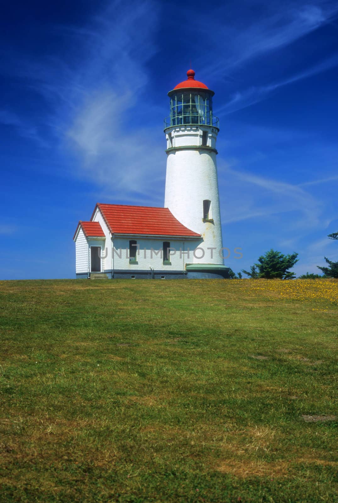 View of the historic Cape Blanco Lighthouse on the scenic southern coast of Oregon.