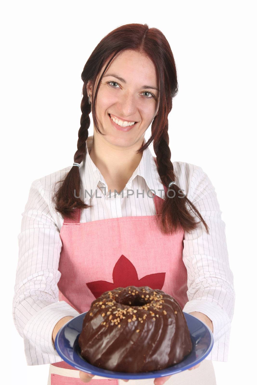 beautiful housewife showing off bundt cake on white background