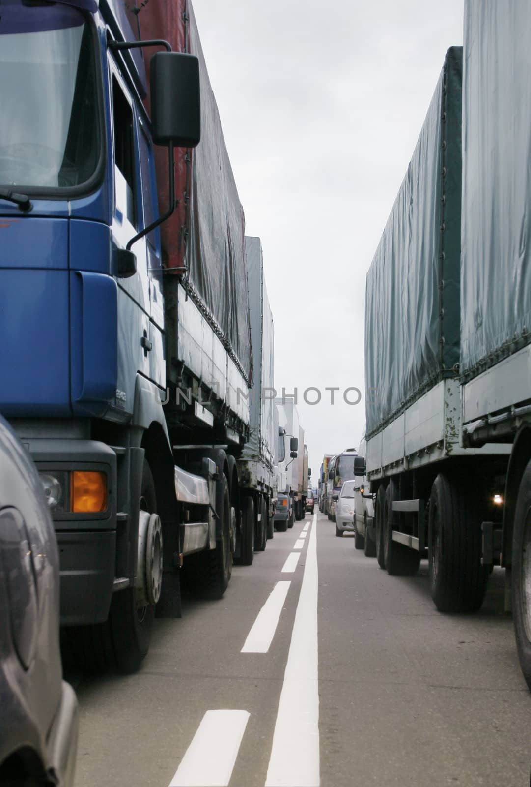 Many cars stopping in one directions. Europe road.
