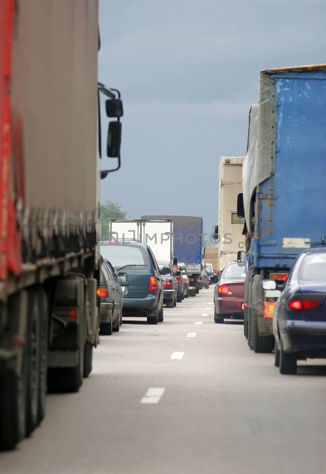 Many cars stopping in one directions. Europe road.
