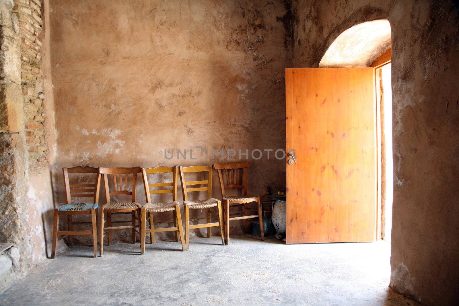 chairs inside a chapel in crete