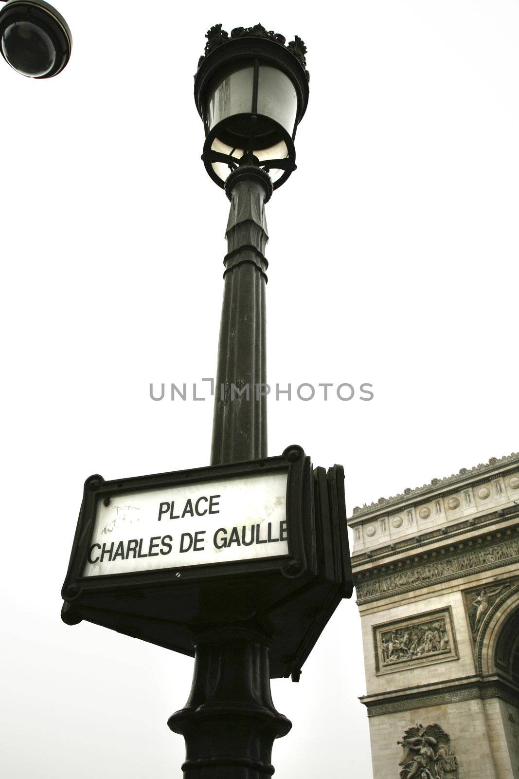 lamppost with de gaulle square sign in paris france