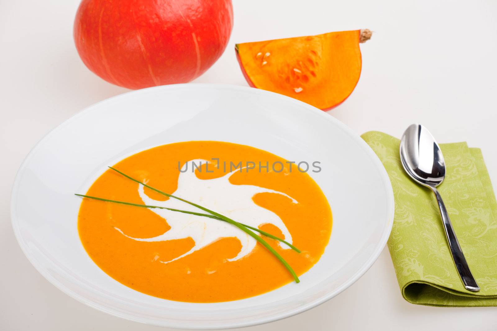 pumpkin soup with hokkaido and a spoon