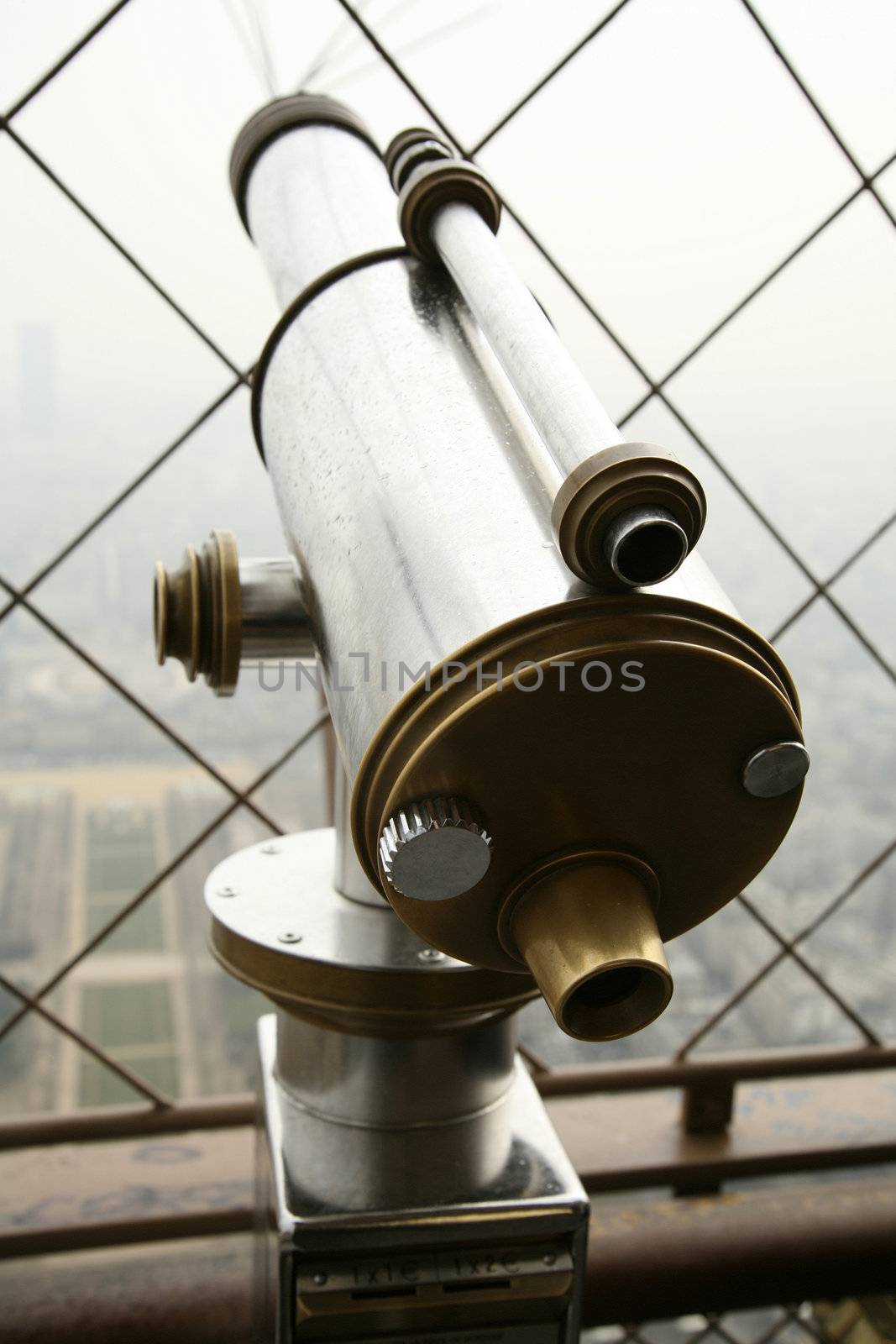 telescope at the top of eiffel tower in paris