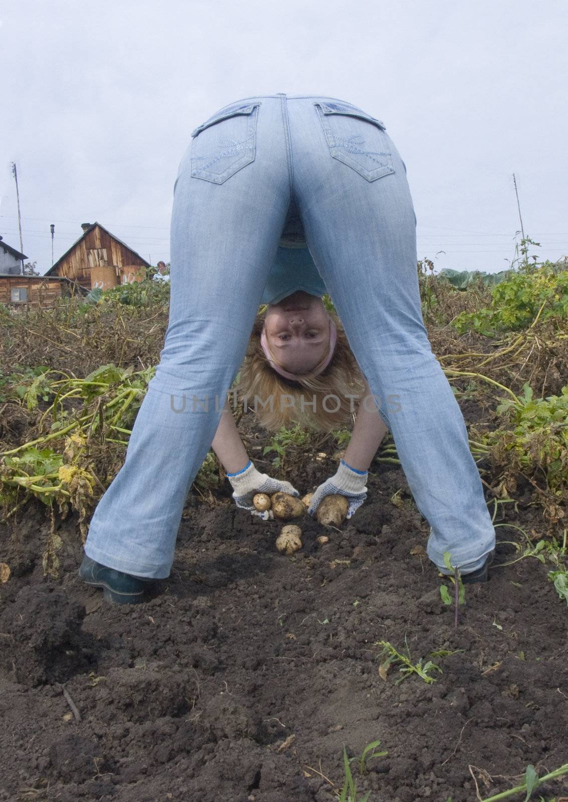 The image of the girl having control over a potato