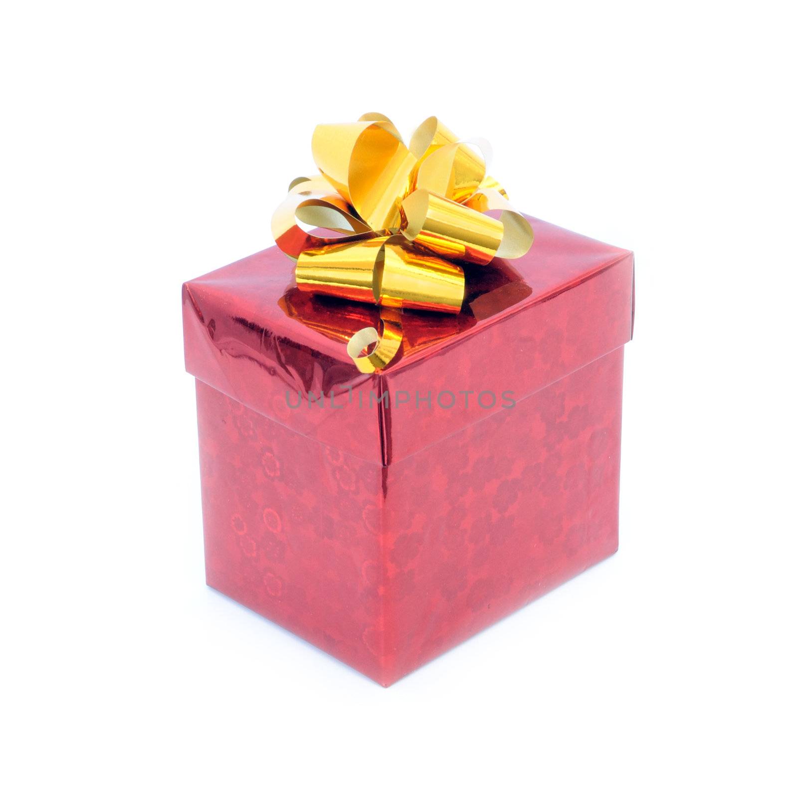 gift box wrapped in red shiny paper