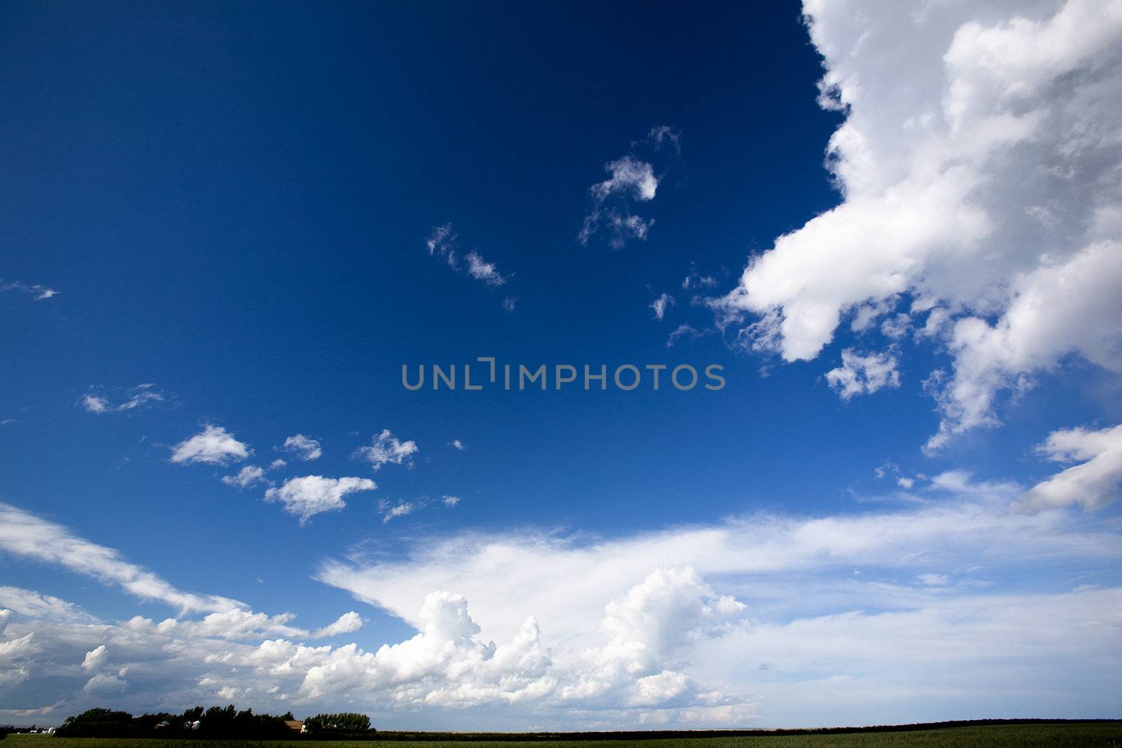 A landscape with a big sky with clouds