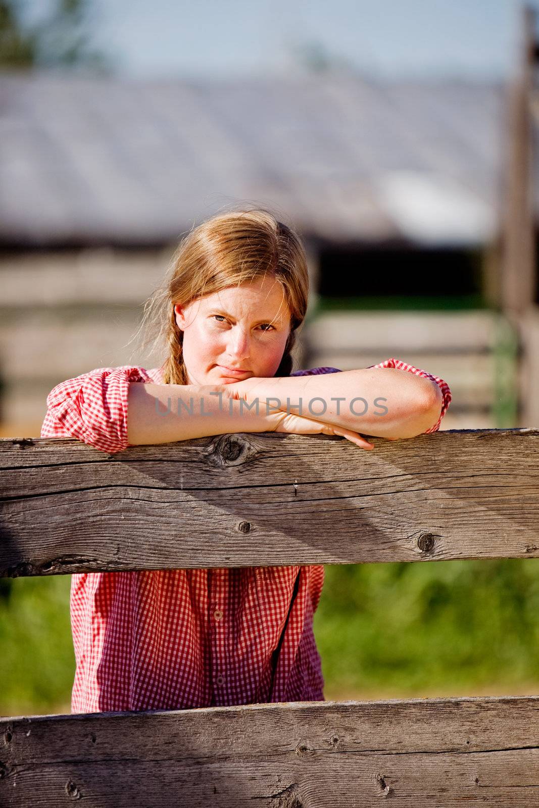 A country farm girl taking a break