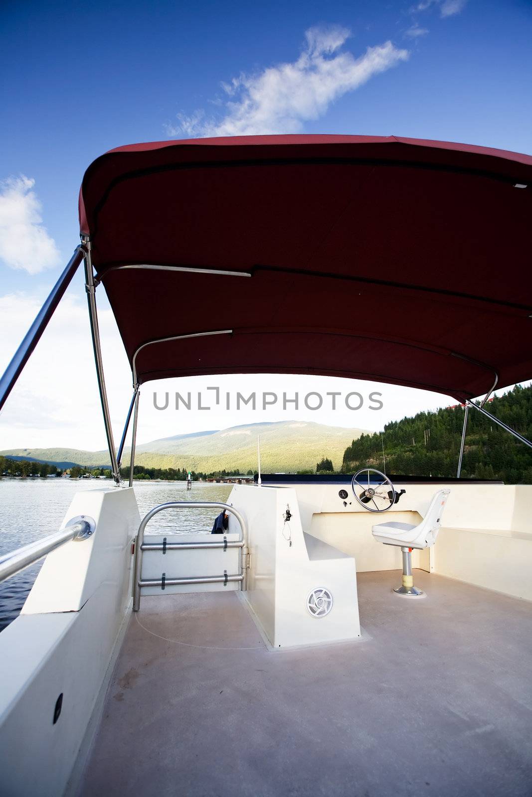 A luxury house boat on a beautiful lake