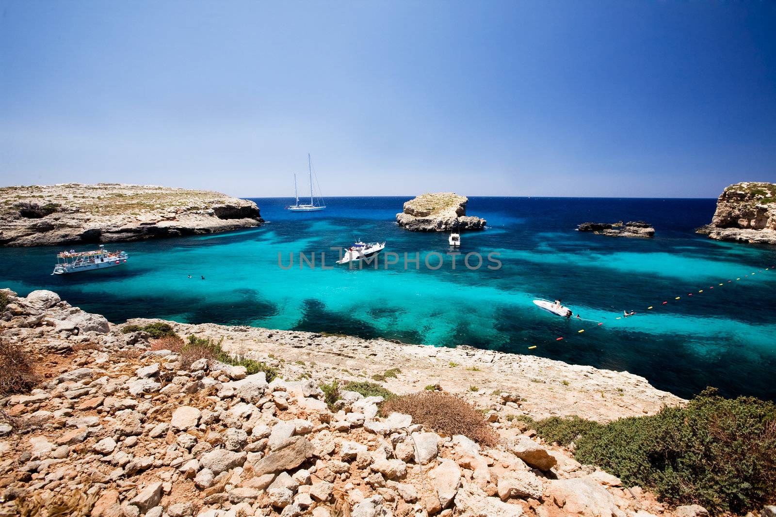 Blug lagoon on a warm summer day on Comino Island, Malta
